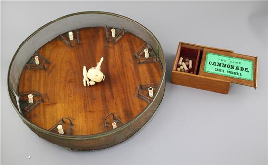 A rare mid 19th century Jaques of London Game of Cannonade of Castle Bagatelle, comprising a circular mahogany board, 38cms diameter,